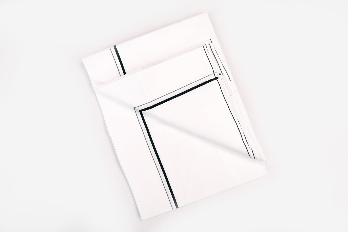 BUY WHITE SINGLE DHOTI SMALL COTTON GREEN BORDER FOR MEN