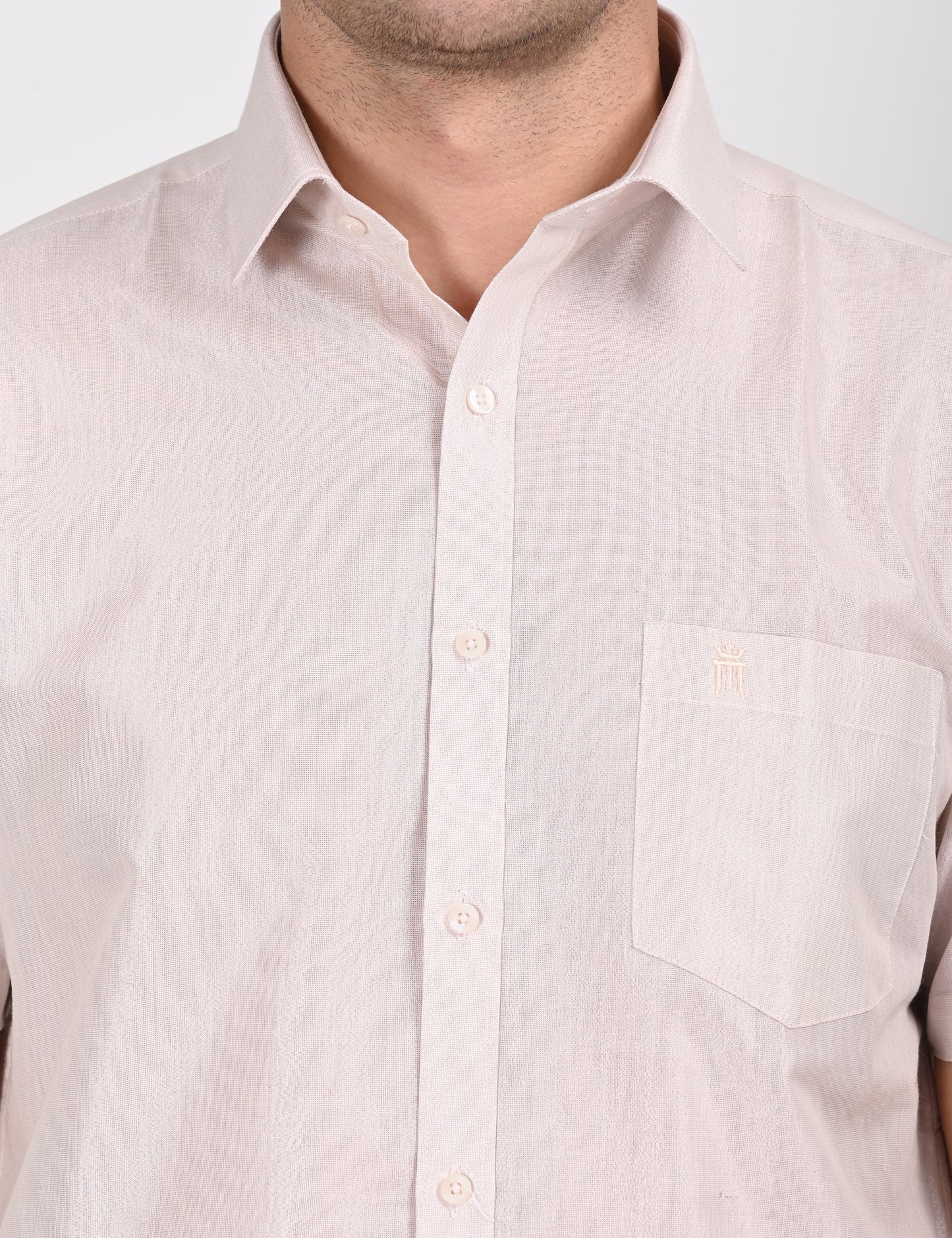 Close-up of the half sleeve shirt from the rose matching single dhoti set, showcasing fine fabric and pocket embroidery detail.