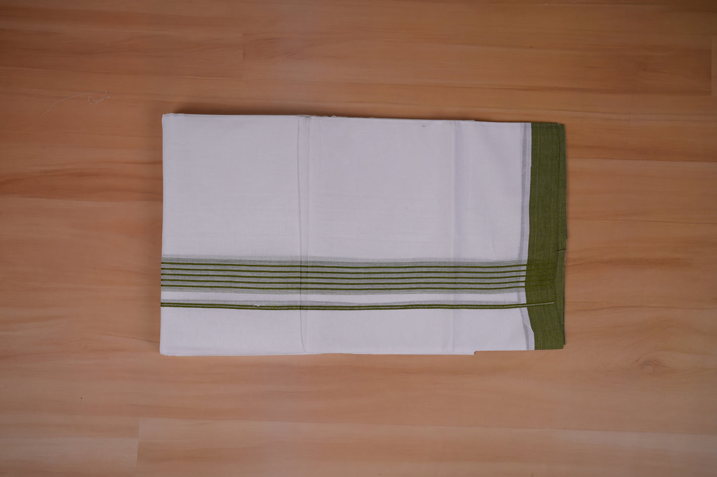 FEATHER FINISH COTTON 4013 W/D DHOTHIE 3.80 MTR-LIGHT GREEN