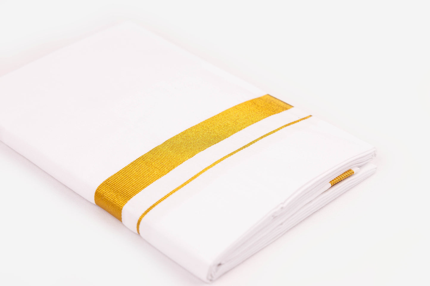 1 inch gold border dhothie for men in white, featuring a luxurious gold jari border design