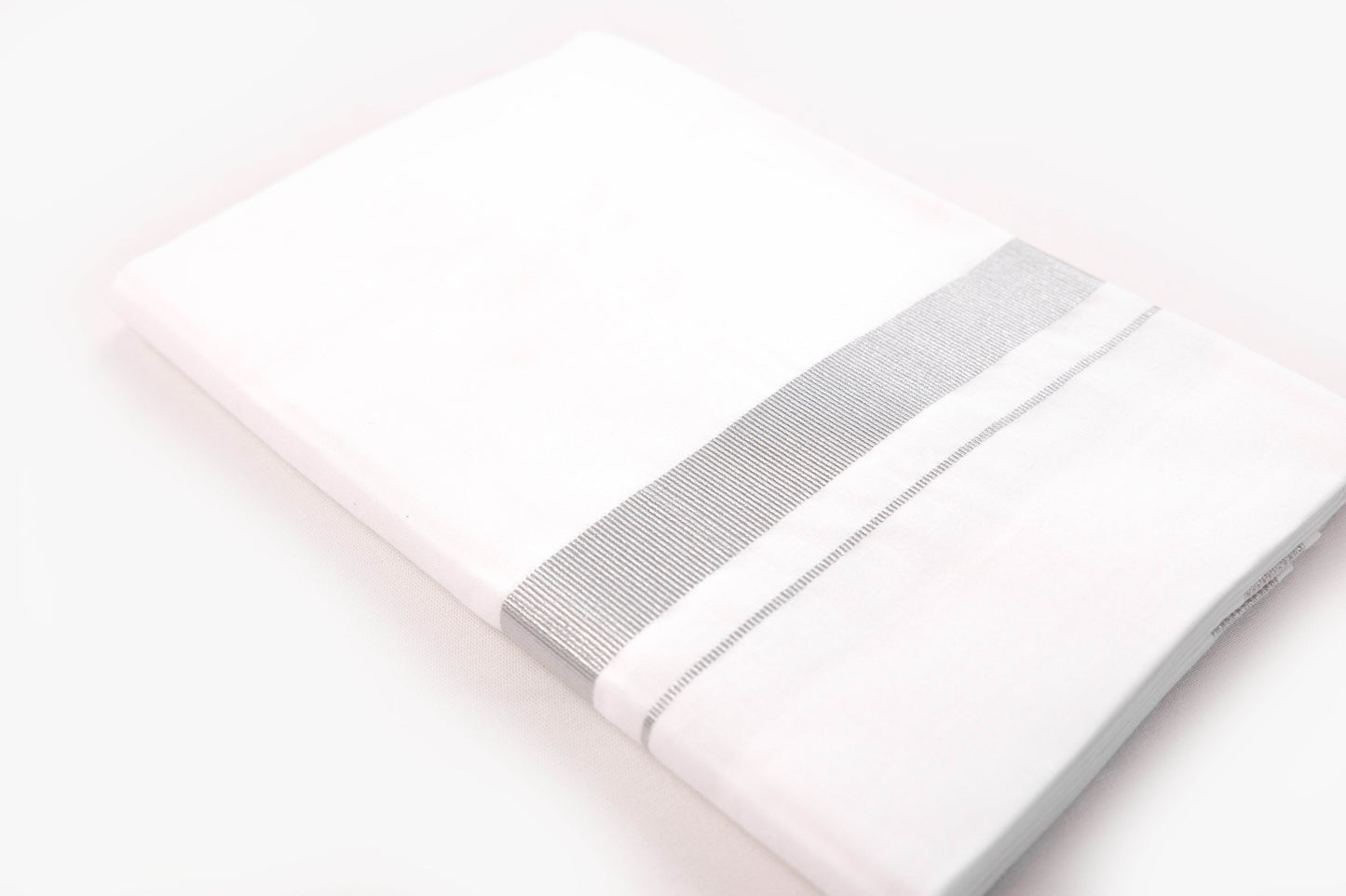 1 inch silver jari border dhothie for men in elegant white fabric, perfect for traditional occasions