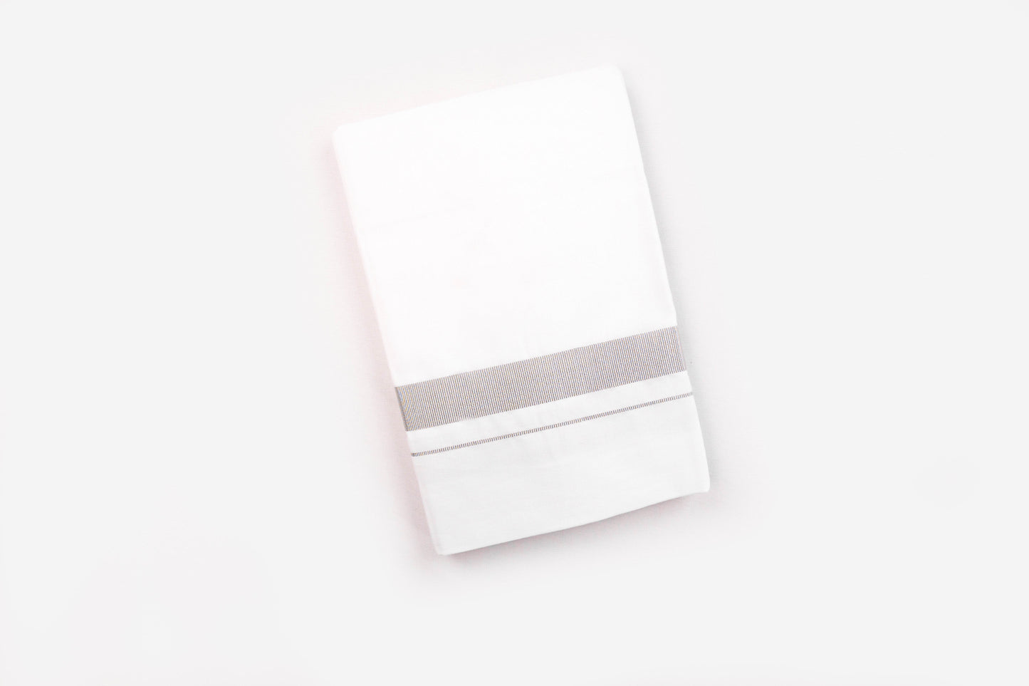 1 inch silver jari border dhothie for men in white fabric with elegant silver detailing